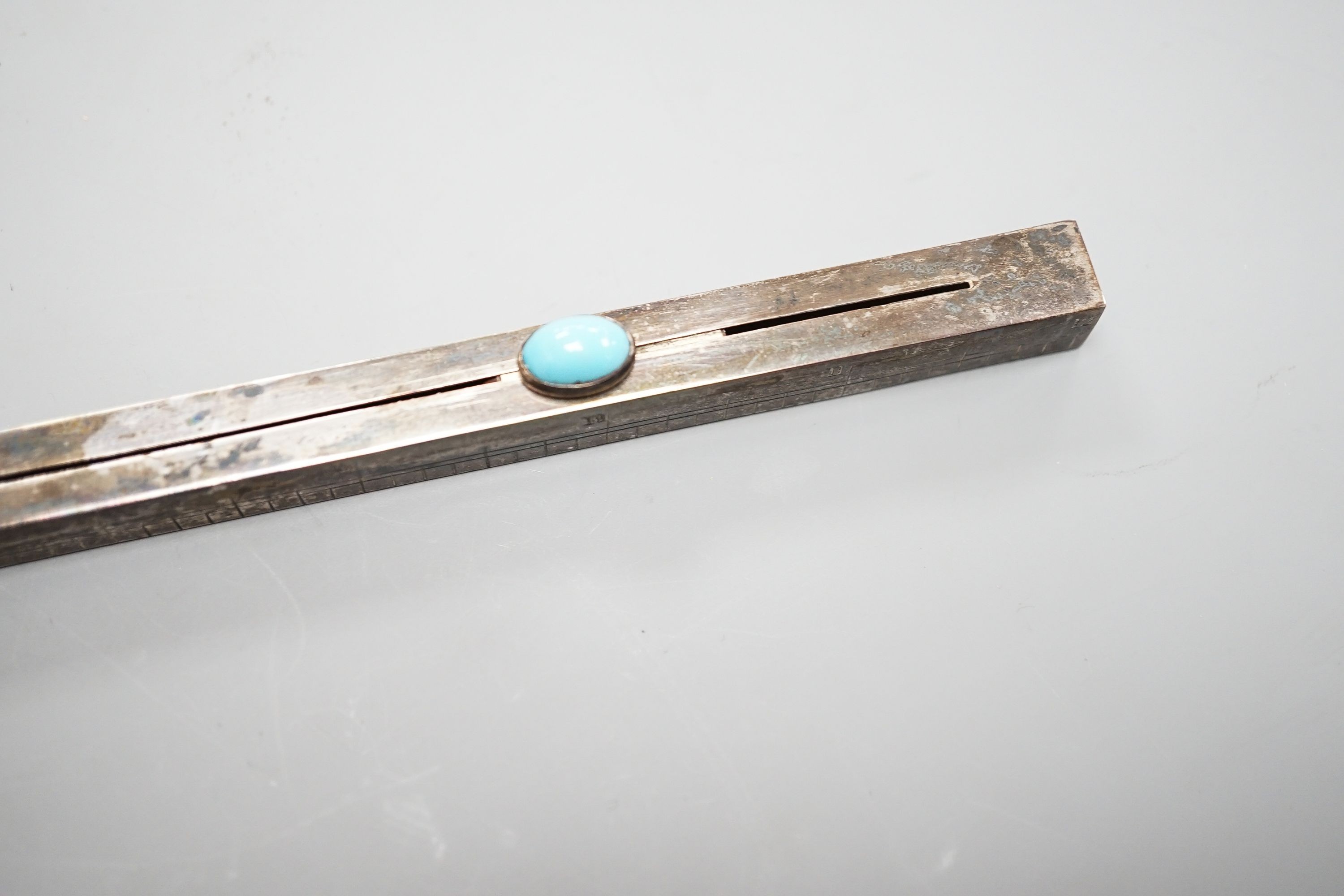 An Edwardian silver combination ruler and double ended propelling pencil, J.C Vickery, London, 1905, 30.5cm.